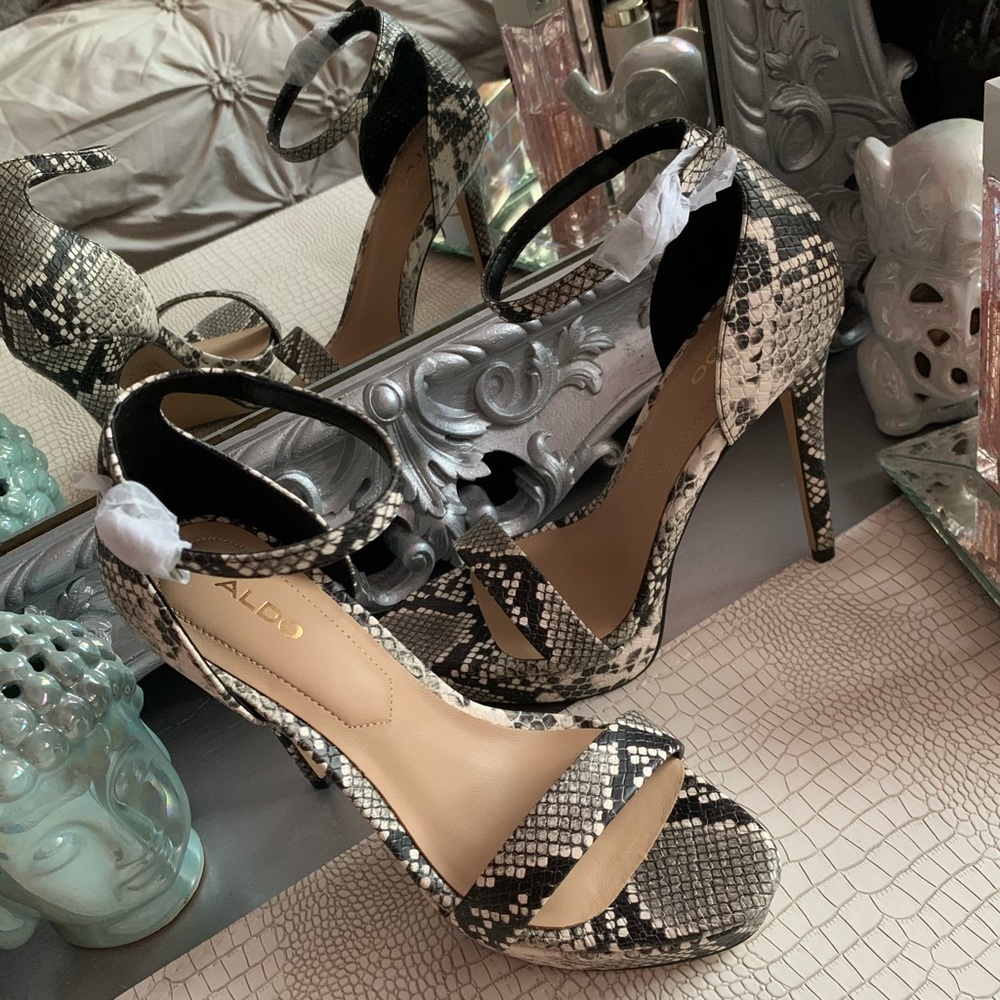 Snakeskin high heel platform shoes